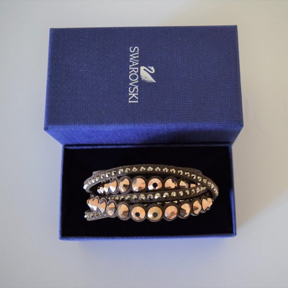 Swarovski Jewelry - NWOT Swarovski Dark Brown Slake Deluxe Bracelet